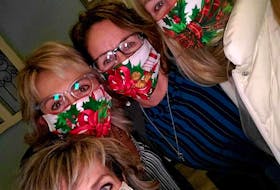 Longtime friends Kim Scattolon, Patricia Peori, Jeannie Phillips and Janice Ferguson are planning to stay safe during the holidays by wearing their three-layer non-medical masks as recommended by Dr. Theresa Tam, chief public health officer for Canada. CONTRIBUTED