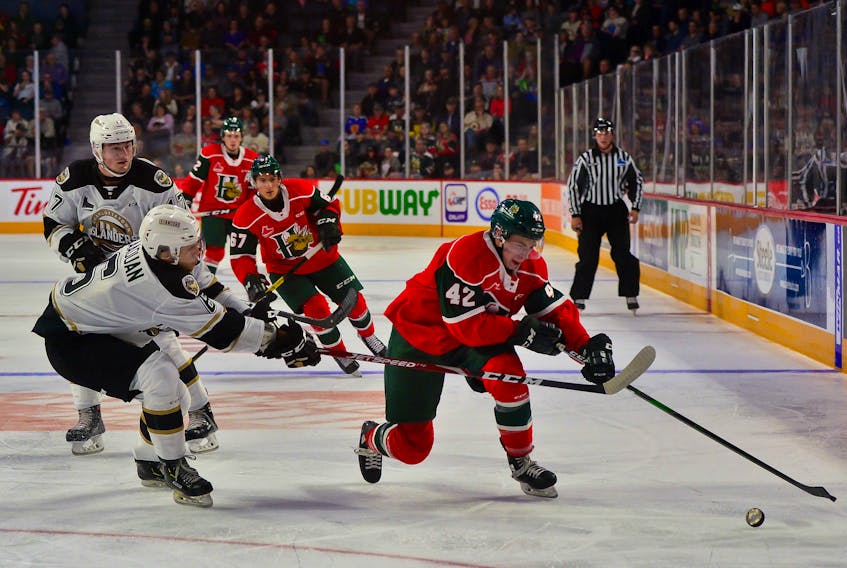Halifax Mooseheads forward Zack Jones, right, tries to beat Charlottetown Islanders defenceman Noah Laaouan during a 2019-20 QMJHL game at the Scotiabank Centre. (CONTRIBUTED/David Chan)
