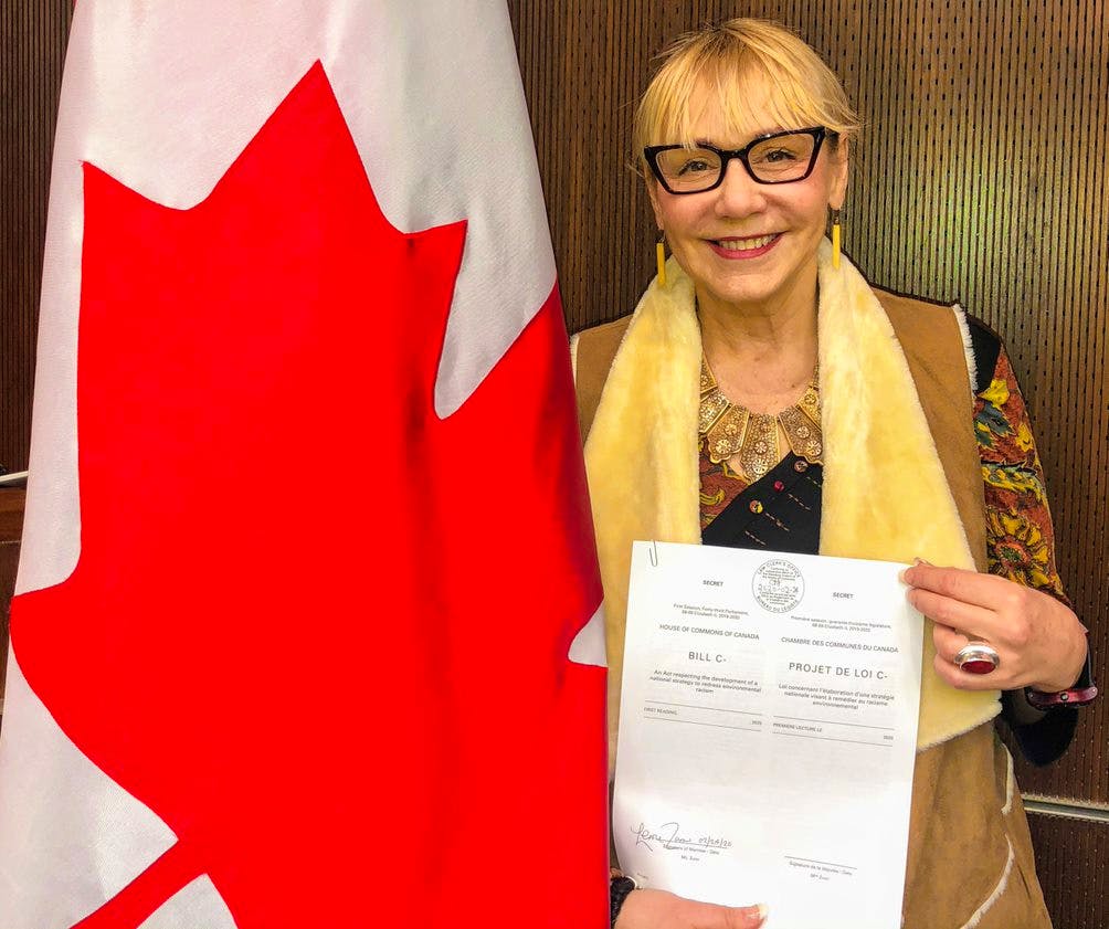 Cumberland-Colchester Liberal MP Lenore Zann poses with her newly signed private member’s bill on Monday, Feb. 24, 2020 in Ottawa. The bill calls for a national strategy to redress environmental racism.